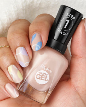 Sally Hansen applied on nails during use to show easy two-step application benefit