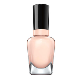 Sally Hansen manicure on a desk scene hinting polished, professional everyday style