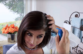 Salon in a Bottle applied along hair part to blend gray roots seamlessly