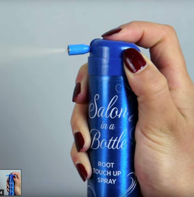 Salon in a Bottle can beside passport illustrating travel-friendly convenience