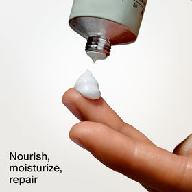 Salt & Stone applying cream in hand for quick softening and non-greasy finish