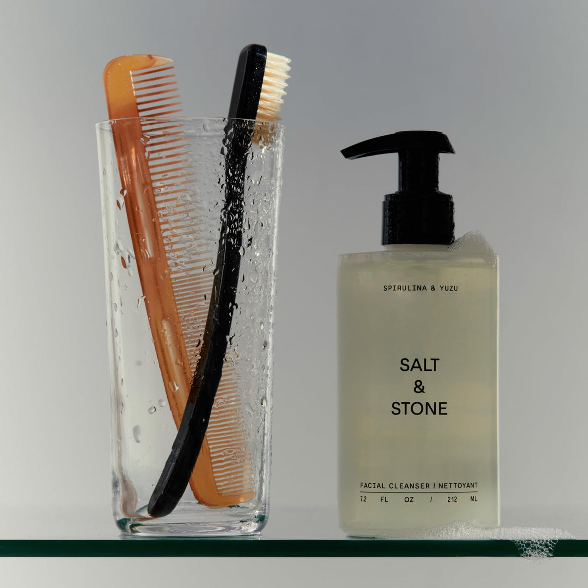 Salt & Stone bottle on bathroom counter lifestyle scene suggesting everyday routine use