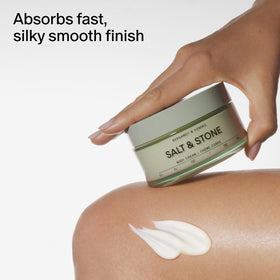 Salt & Stone close-up label with bergamot and hinoki notes, signals scent profile