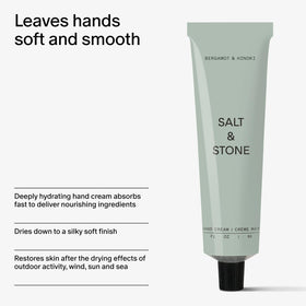 Salt & Stone tube next to hand for size comparison and portable convenience