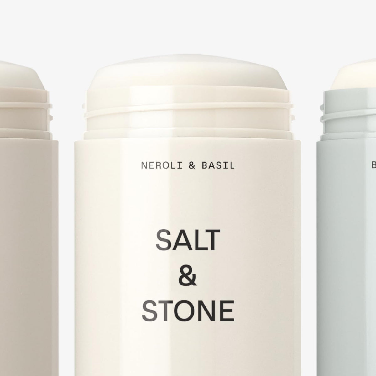 Salt & Stone deodorant stick held in hand for size comparison and travel-ready benefit
