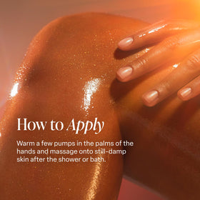 Saltair model applying oil to shoulder for hydrated, glowing skin