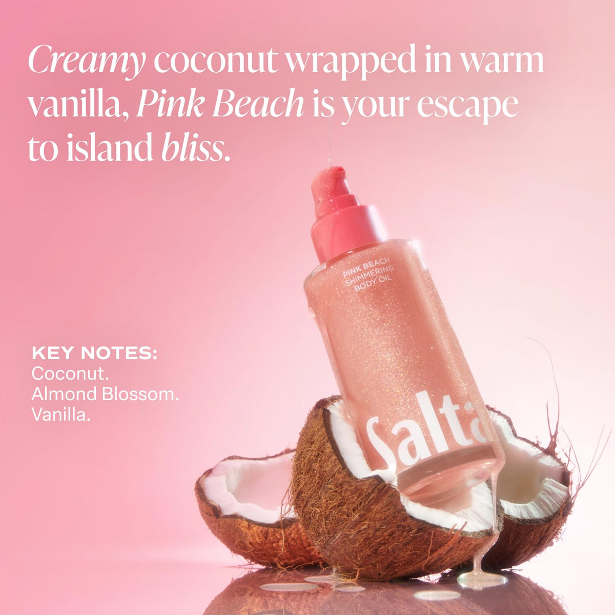 Saltair bottle staged on sand evoking tropical Pink Beach scent