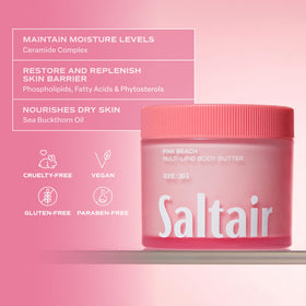 Hand smoothing Saltair body butter into skin demonstrating non-greasy finish