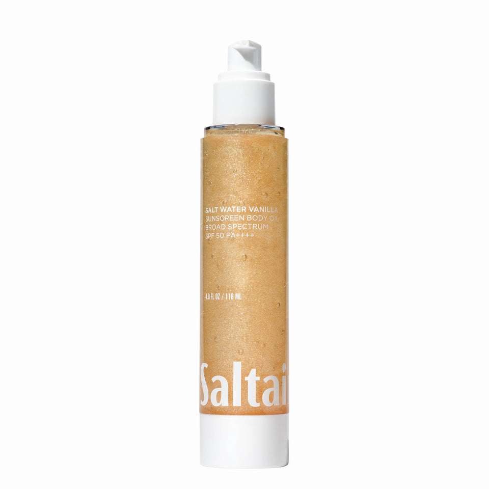 Saltair SPF Body Oil front pump bottle showing easy application and travel-ready size