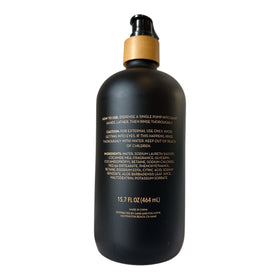 Sand + Fog Teakwood pump dispensing soap onto hand demonstrating moisturizing lather