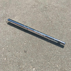 Sandstone Scandinavia pencil held in hand for scale showing compact size and easy handling