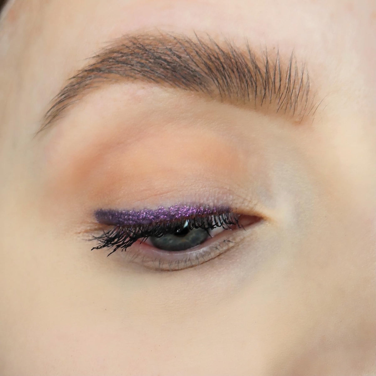 Sandstone Scandinavia pencil swatches on skin showing rich purple payoff benefit