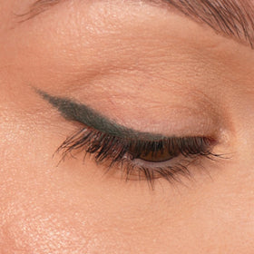 Sandstone Scandinavia texture swatch on skin displays rich green pigment and lasting payoff