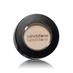 Sandstone Scandinavia swatch on eyelid showing matte white payoff and natural finish