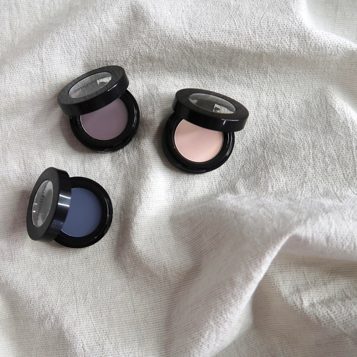 Sandstone Scandinavia on vanity with tools showing everyday wearable, sensitive-friendly makeup