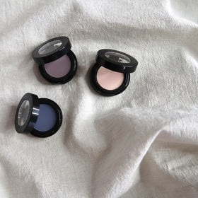 Sandstone Scandinavia on vanity with tools showing everyday wearable, sensitive-friendly makeup