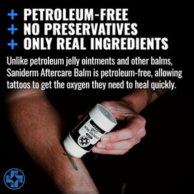 Saniderm balm being applied to forearm, protecting fresh tattoo skin