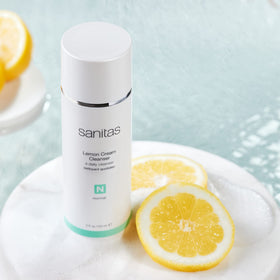 Sanitas creamy lemon cleanser texture close-up showing smooth hydrating finish
