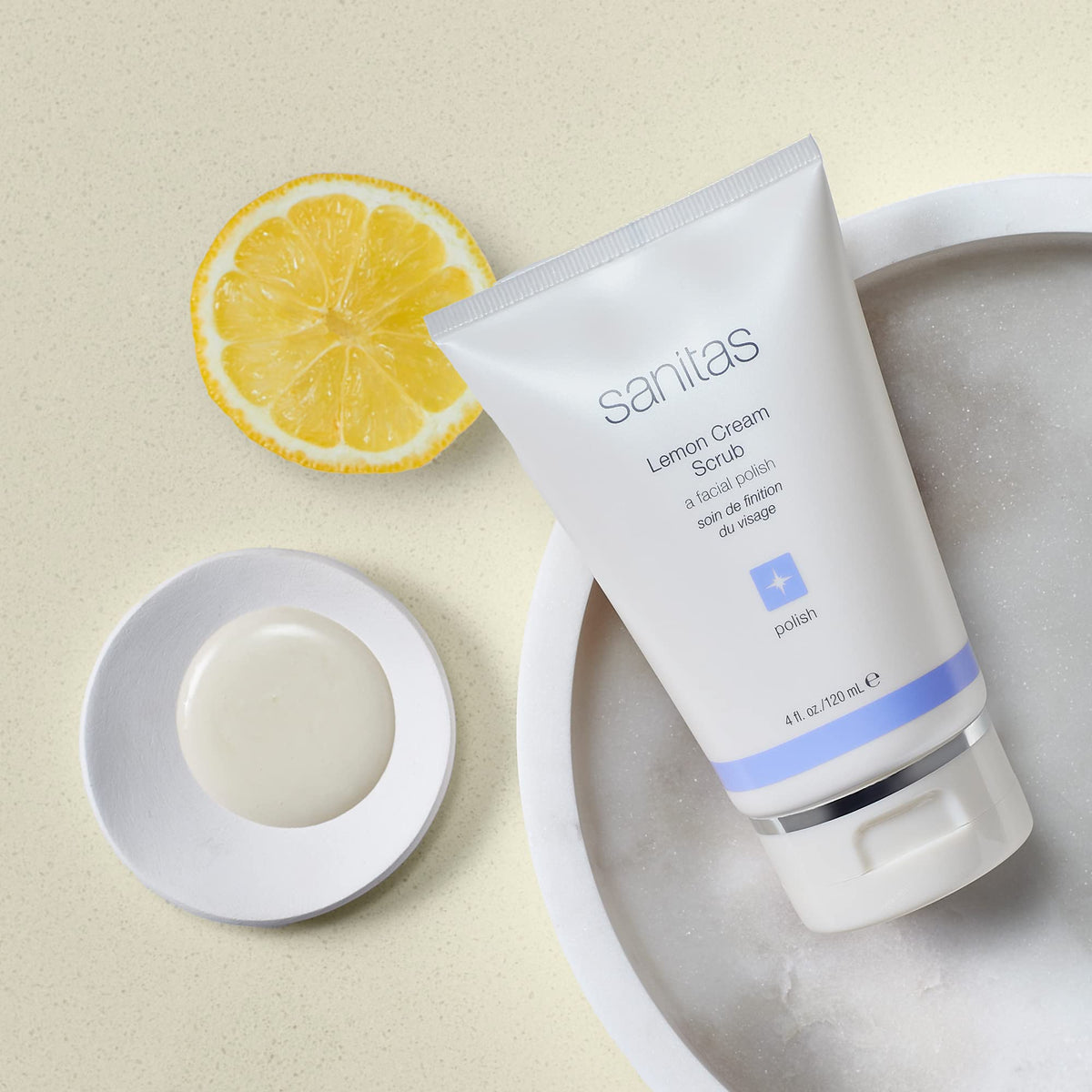 Sanitas lemon cream scrub texture close-up reveals fine silica crystals for gentle exfoliation