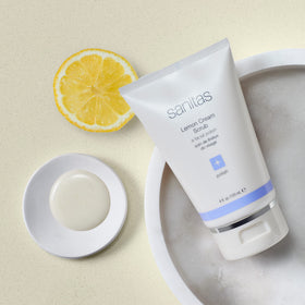 Sanitas lemon cream scrub texture close-up reveals fine silica crystals for gentle exfoliation