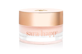 Sara Happ Lip Slip Luxe Balm front packaging showing product label and compact design benefits