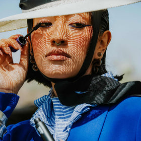 SARELLY model applying mascara for lifted, waterproof wear