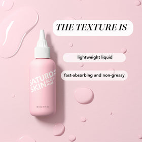 Saturday Skin applying serum to scalp with fingers to support follicle health