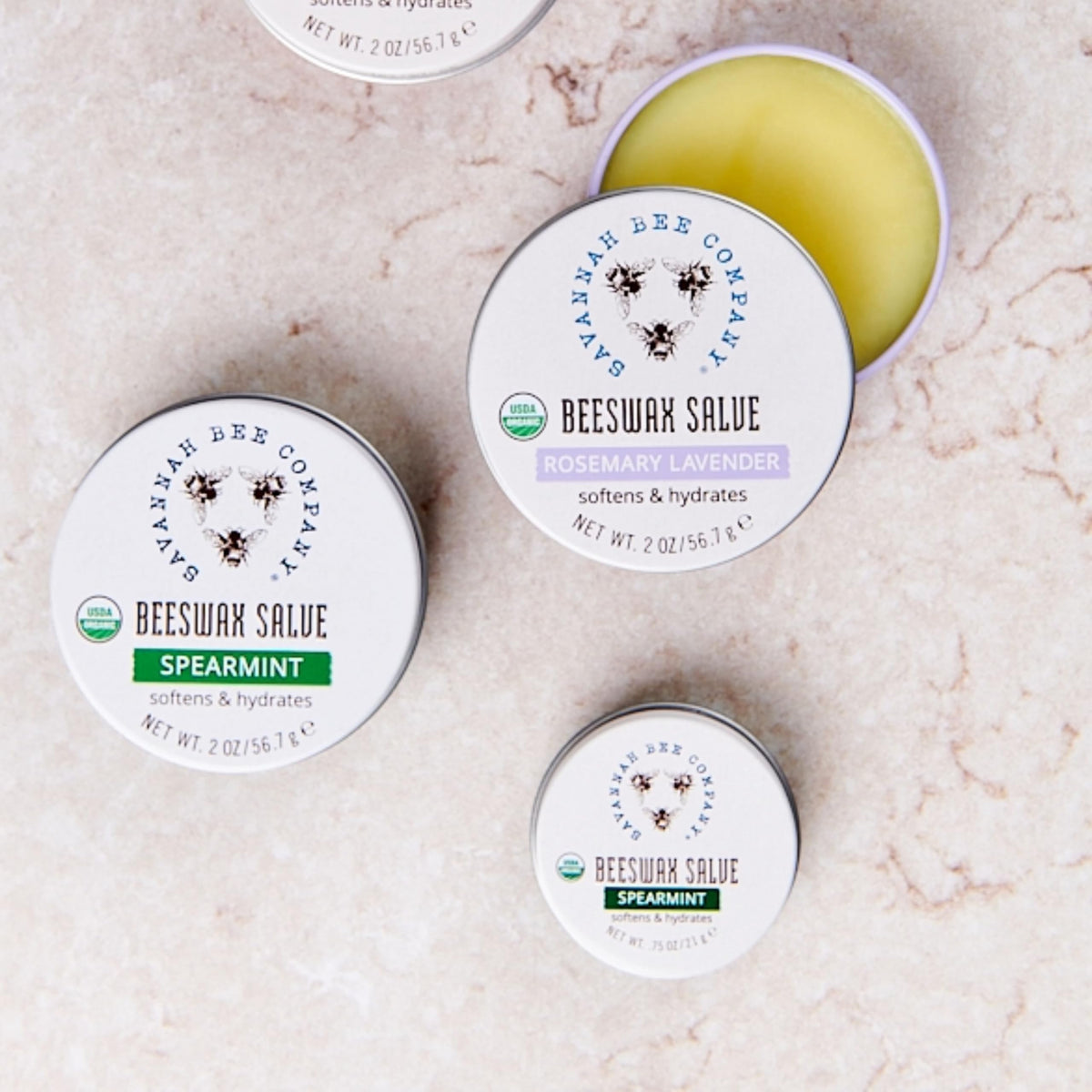 Savannah Bee Company salve stored in a purse pocket for on-the-go hydration