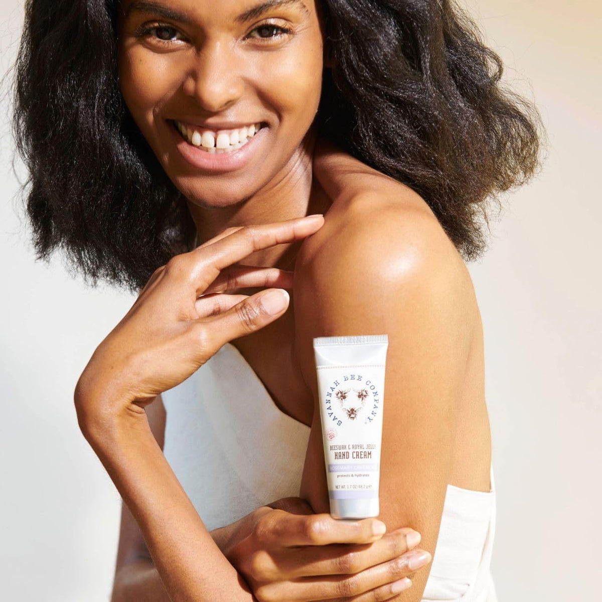 Savannah Bee Company tube dispensing cream illustrating easy application benefit