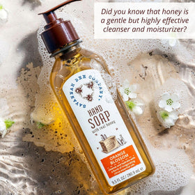 Savannah Bee Company pump close-up dispensing soap, highlighting easy one-hand use
