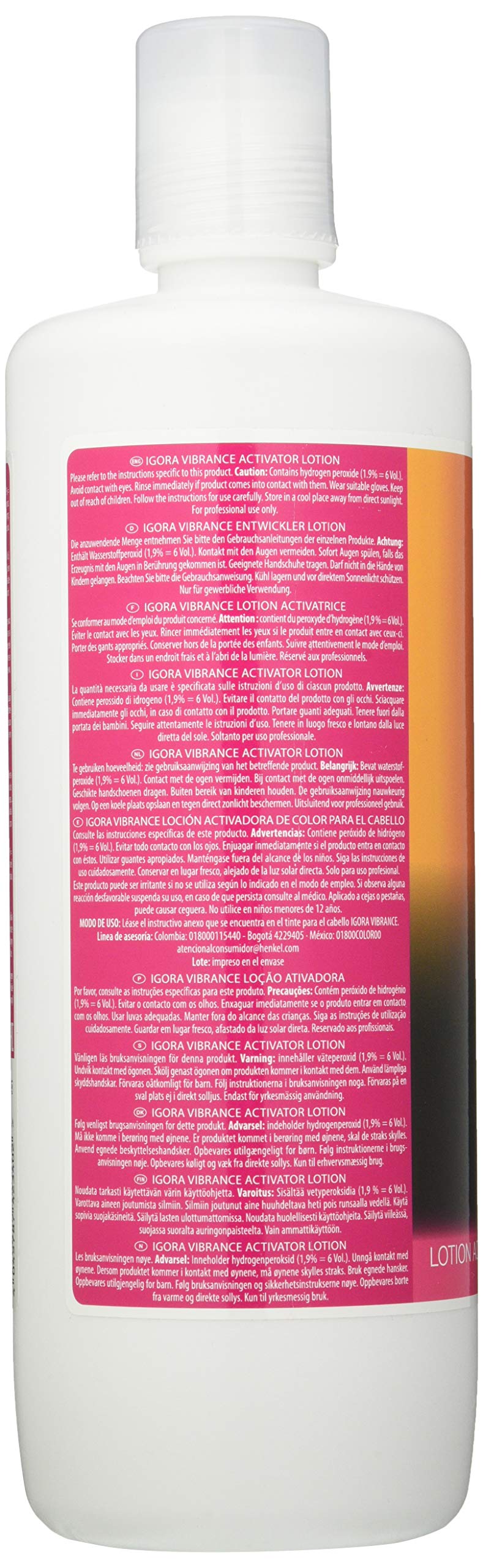 Schwarzkopf in-salon use showing stylist applying developer for precise color results
