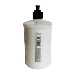 Scottish Fine Soaps Au Lait lotion being dispensed showing smooth texture