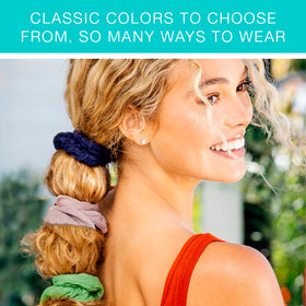 scunci scrunchie holding a high ponytail securely during activity