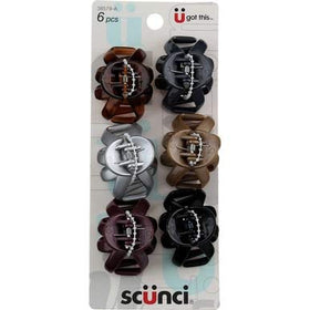 Scunci clips stored in small pouch for organized travel and protection