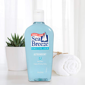 Seabreeze bottle in hand for scale showing 10 fl oz size and travel readiness