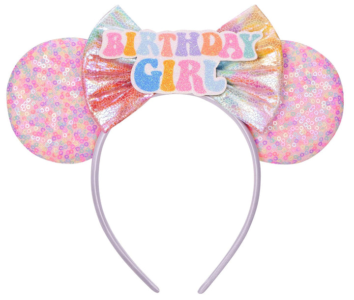 Seamoy front view of pink rainbow ear headband showing festive design and shimmer
