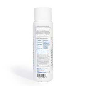 Seaweed Bath Co. creamy shampoo texture on palm illustrating lightweight moisture