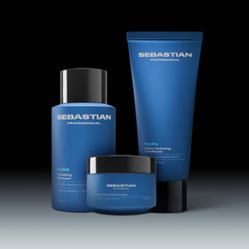 Sebastian Drench on bathroom shelf among towels depicting salon-quality routine at home