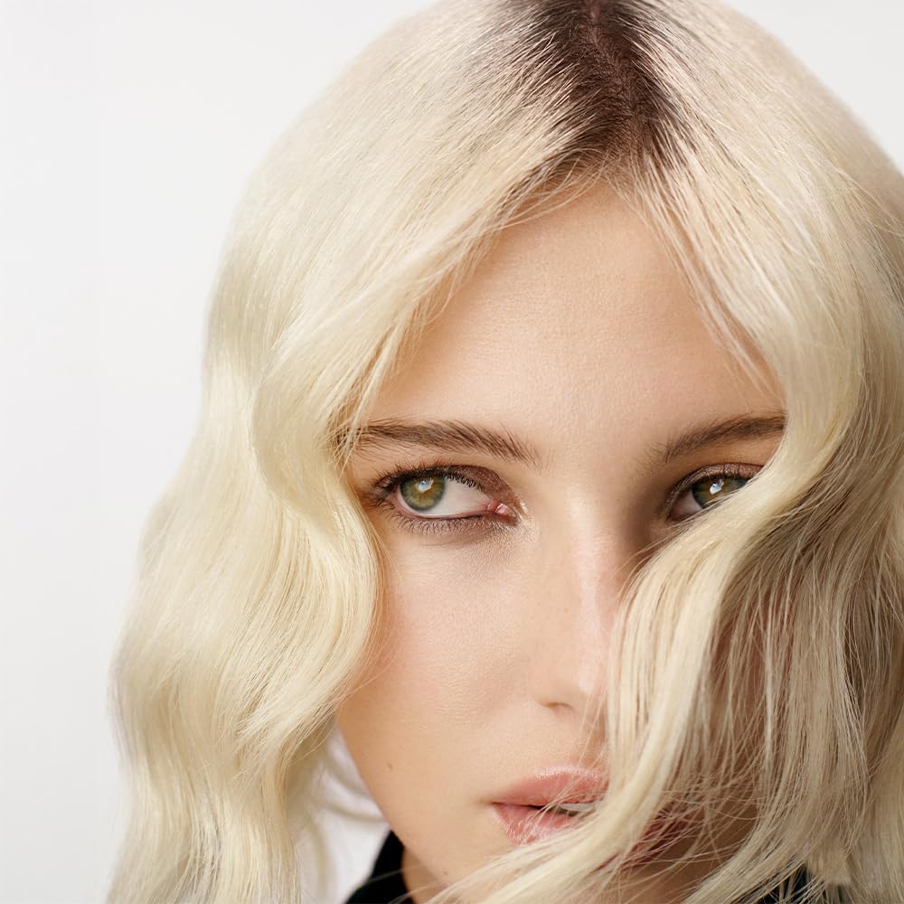 Sebastian No Breaker applied to damp hair demonstrating heat protection