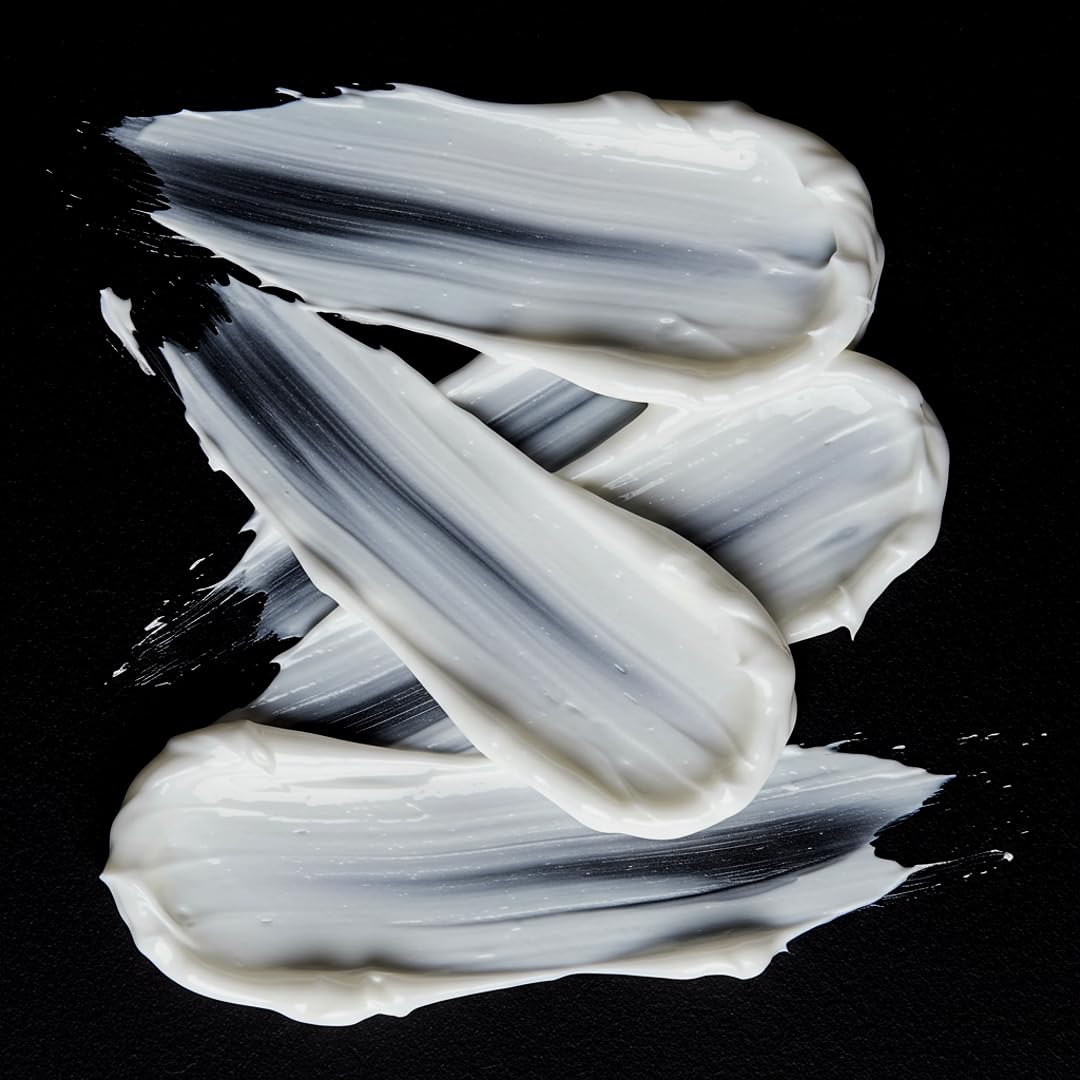 Sebastian Penetraitt mask dispensed on hair strand showing concentrated coverage and shine
