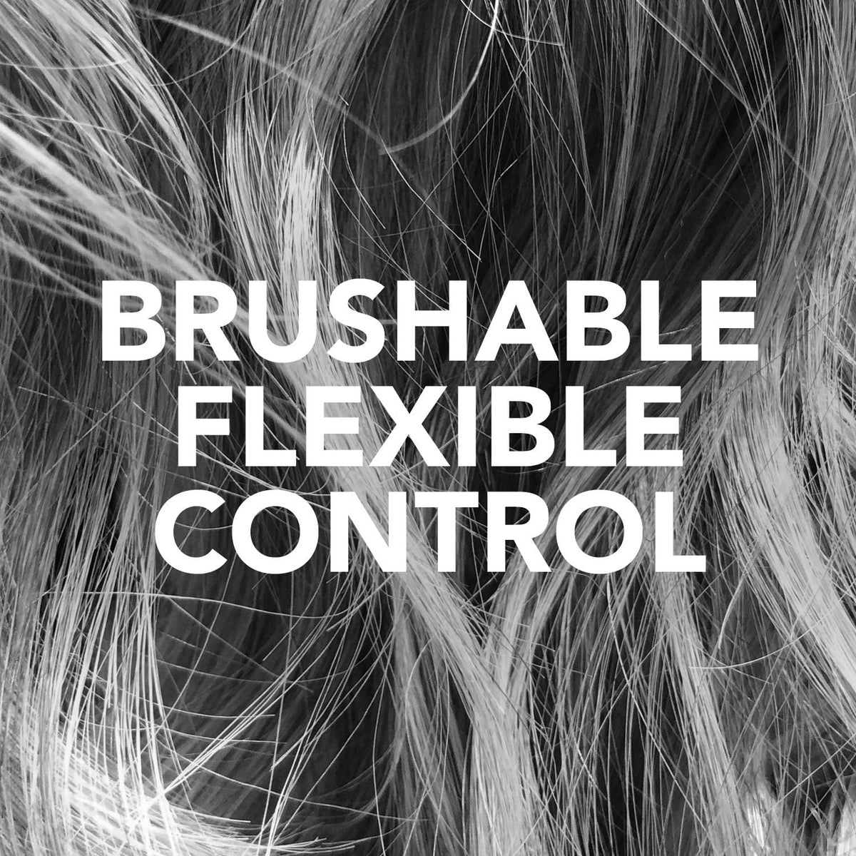 Sebastian Shaper mini spraying onto styled hair for instant hold