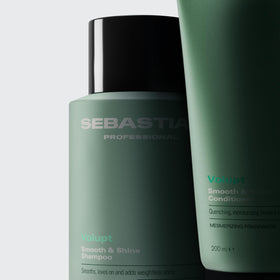 Sebastian shampoo applied to wet hair in shower for effective cleansing