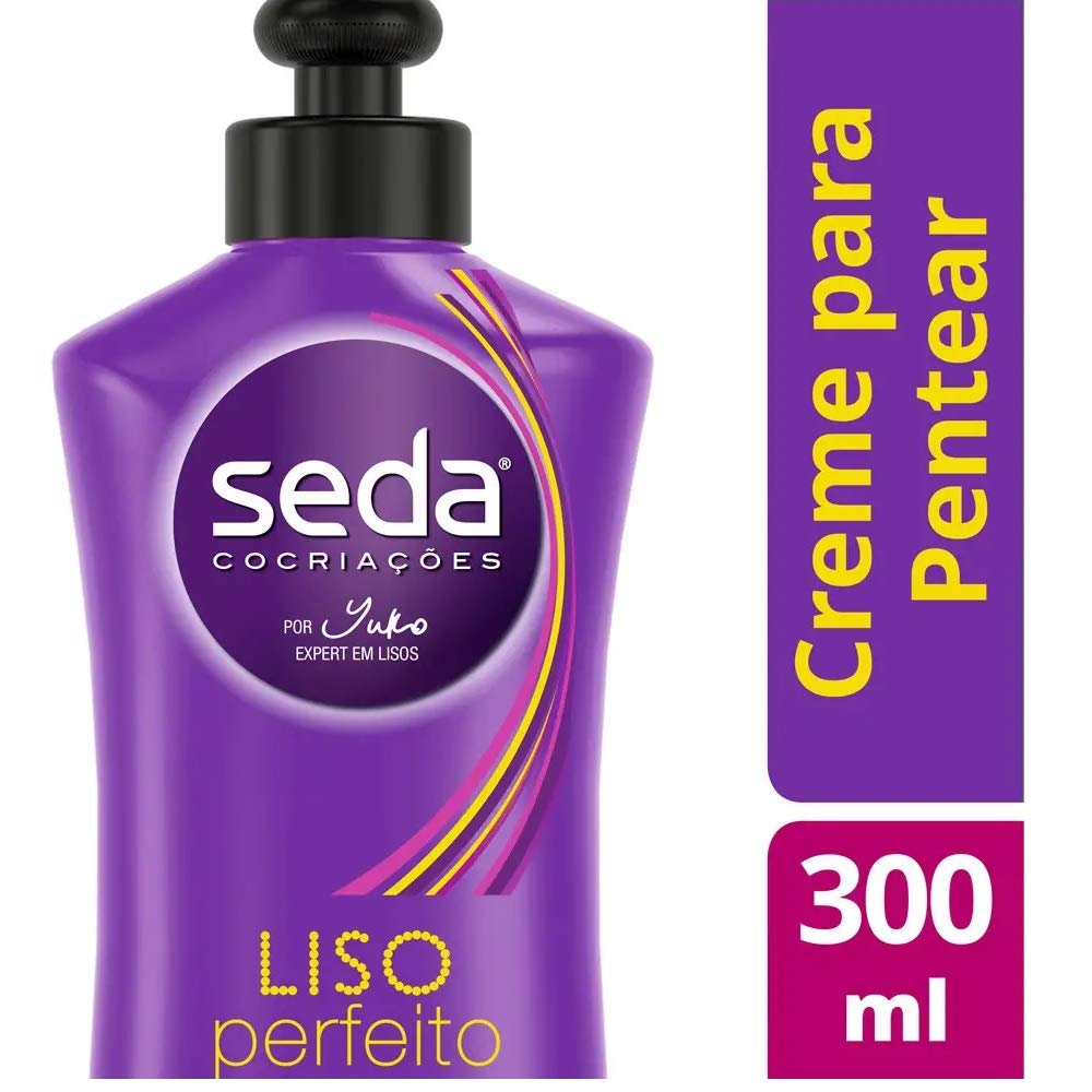 Seda cream texture close-up on fingers, showing smooth consistency for easy combing