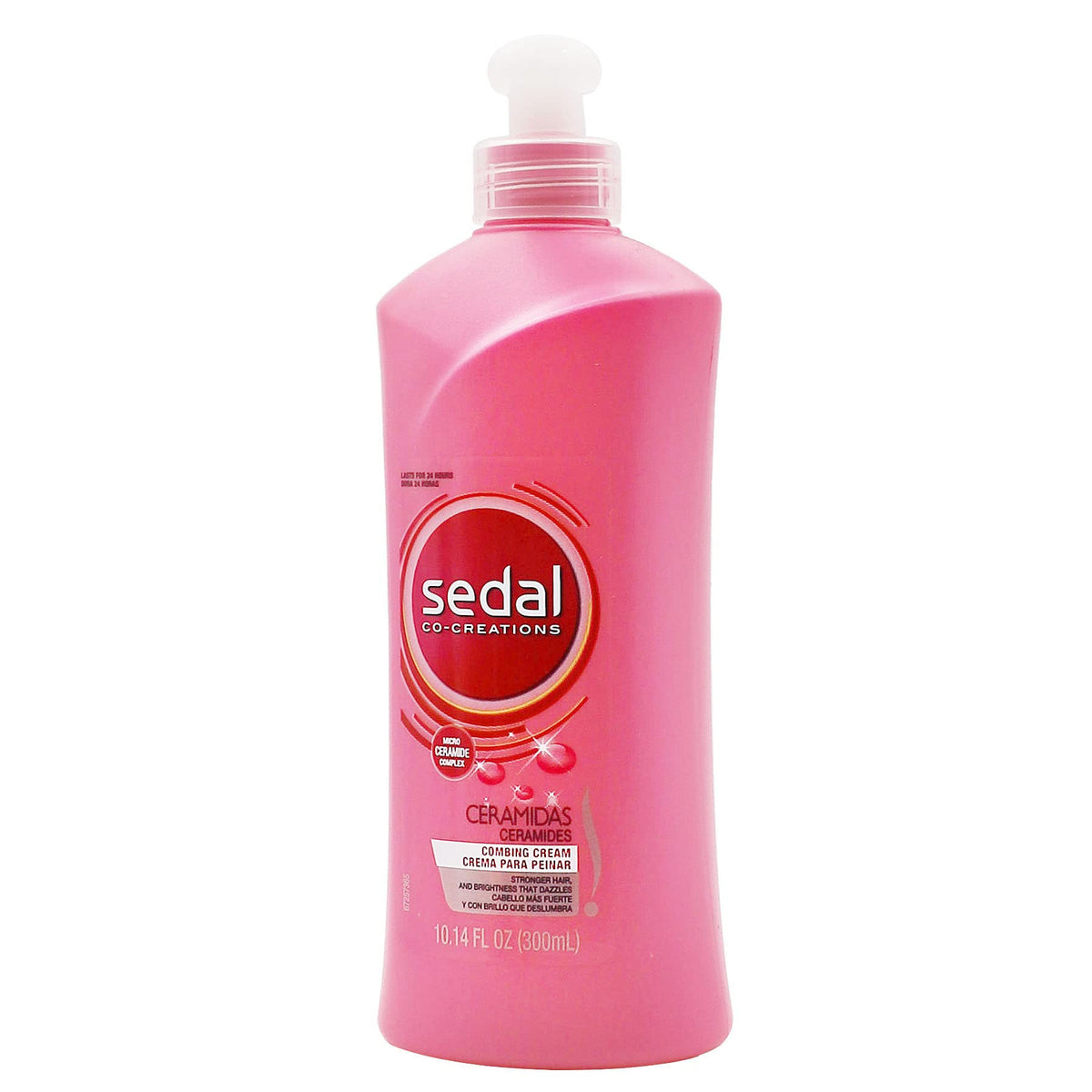 Sedal in use on damp hair demonstrating smoother, frizz-controlled results