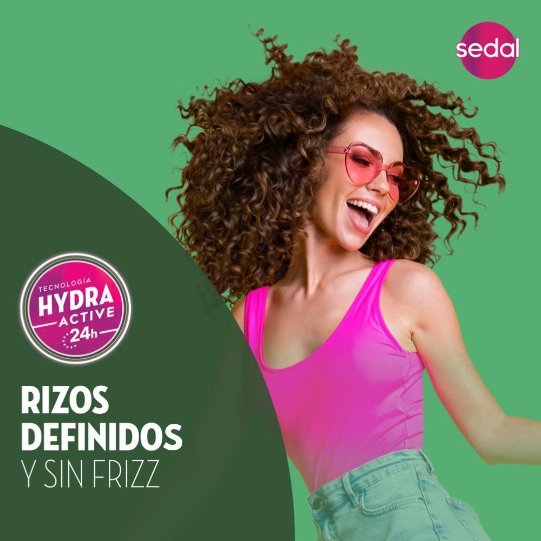 Sedal lifestyle shot of curly hair outdoors showing natural-looking defined curls