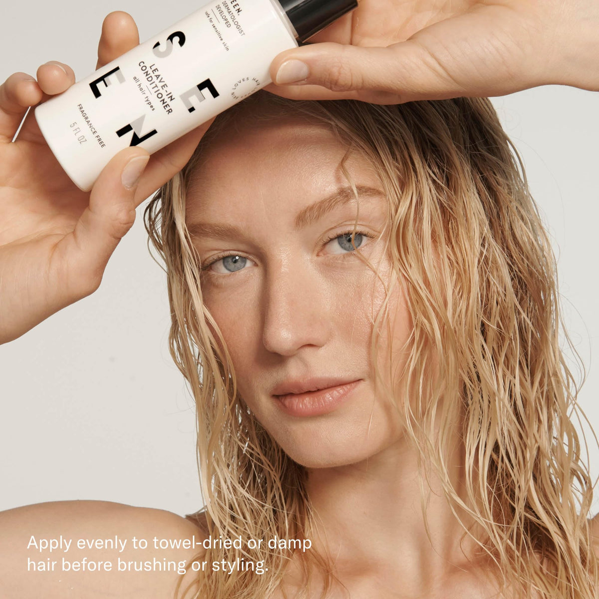 SEEN applied to wet hair while combing to demonstrate detangling and smoothing effect