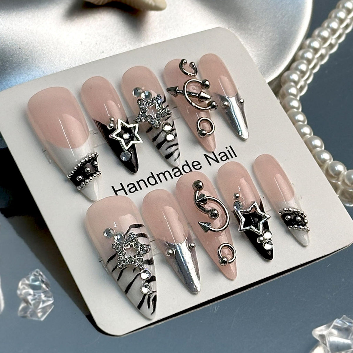 SEENEEY close-up of silver rhinestone charm highlighting sparkle and detailed design
