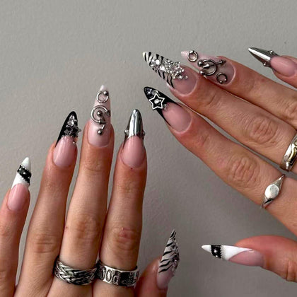 SEENEEY front view of black almond nails with silver rhinestones showing polished finish