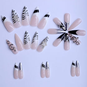 SEENEEY nails held in hand to show scale and comfortable length for wear