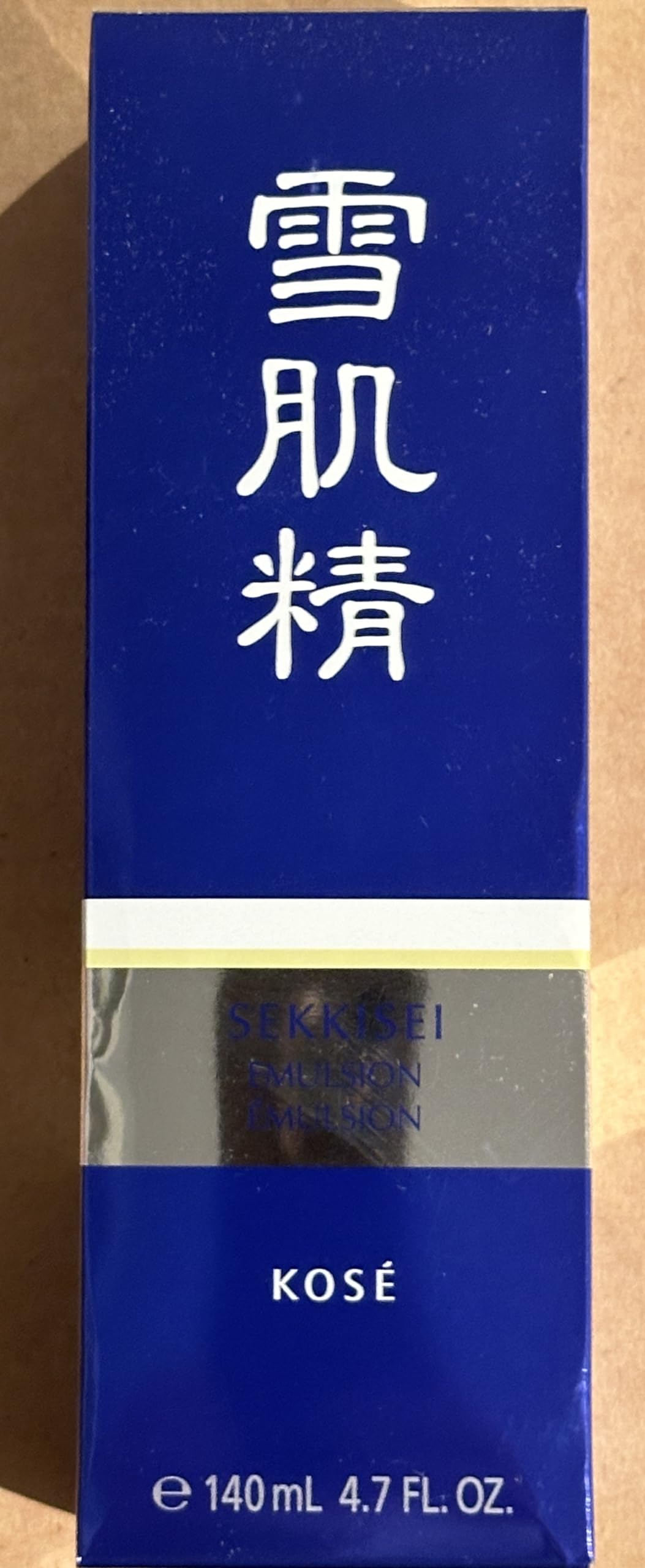 SEKKISEI emulsion staged on sink showing daily routine layering benefit